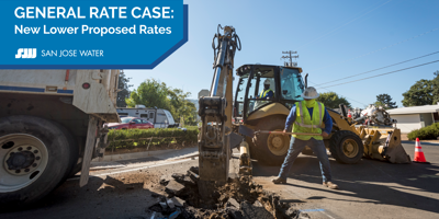 San Jose Water employees working on a water pipe in the street