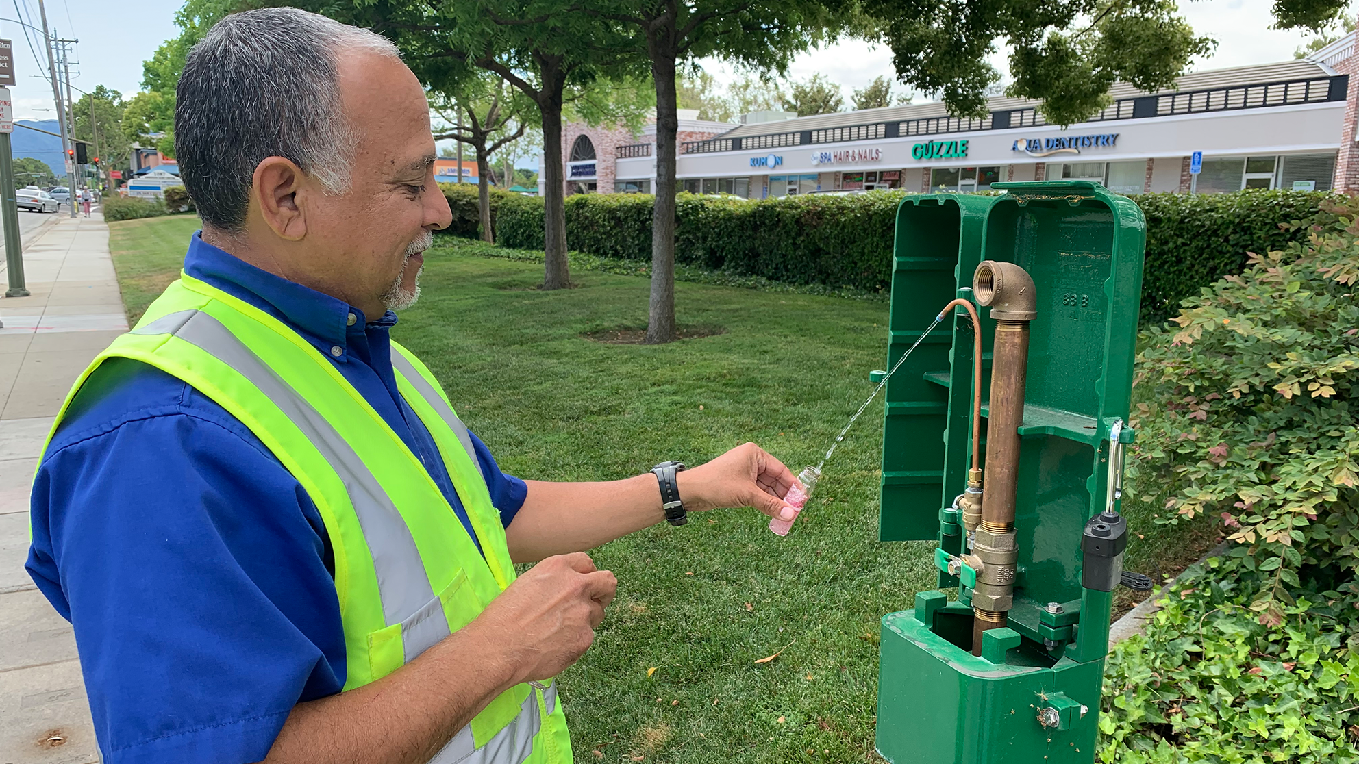 San Jose Water employee checking water outlet