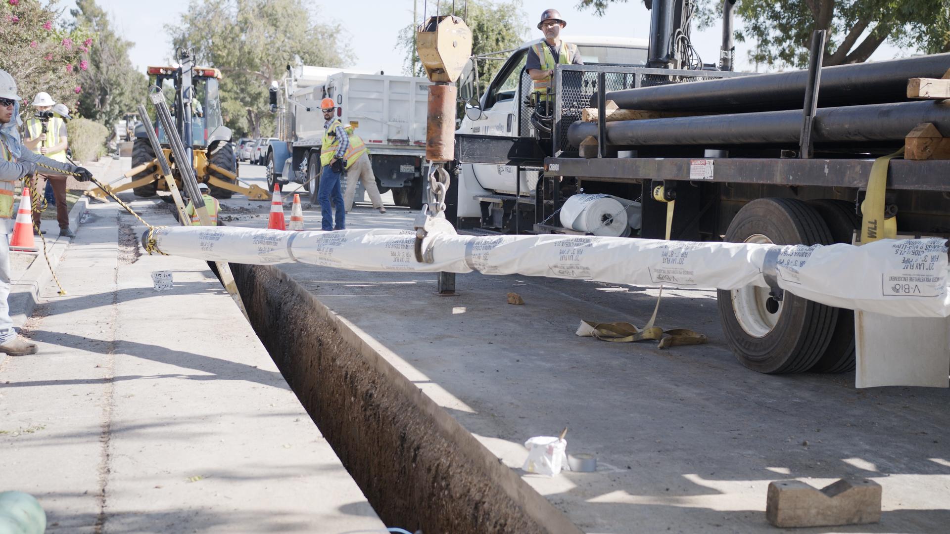 SJW crew replacing pipe